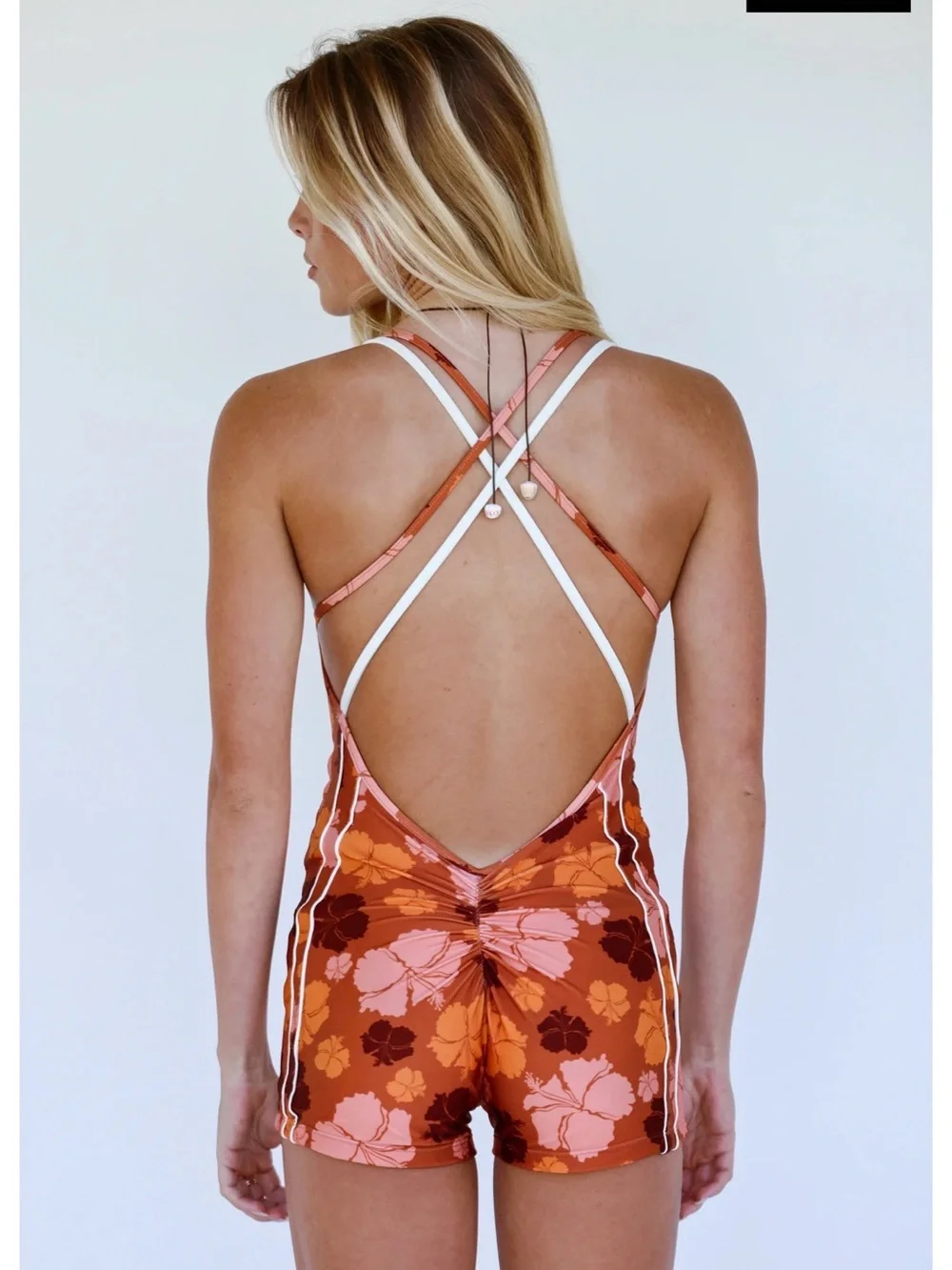 Strait. The Label. One piece hibiscus romper